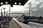 AMTK 665 leads train 84.